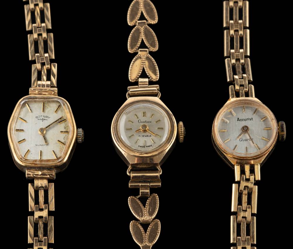 Audax, a 9 carat gold lady's wristwatch,: the white dial with baton markers,