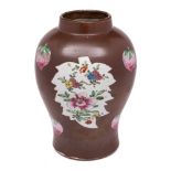 A Chinese Batavian-ware famille rose baluster vase: enamelled with peaches and leaf-shaped panels