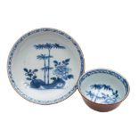 A Chinese 'Nanking Cargo' Batavian teabowl and saucer: painted in cafe-au-lait and underglaze blue