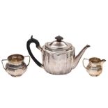 A mixed lot of silver tea wares: includes a George III silver teapot, maker John Riley, London,