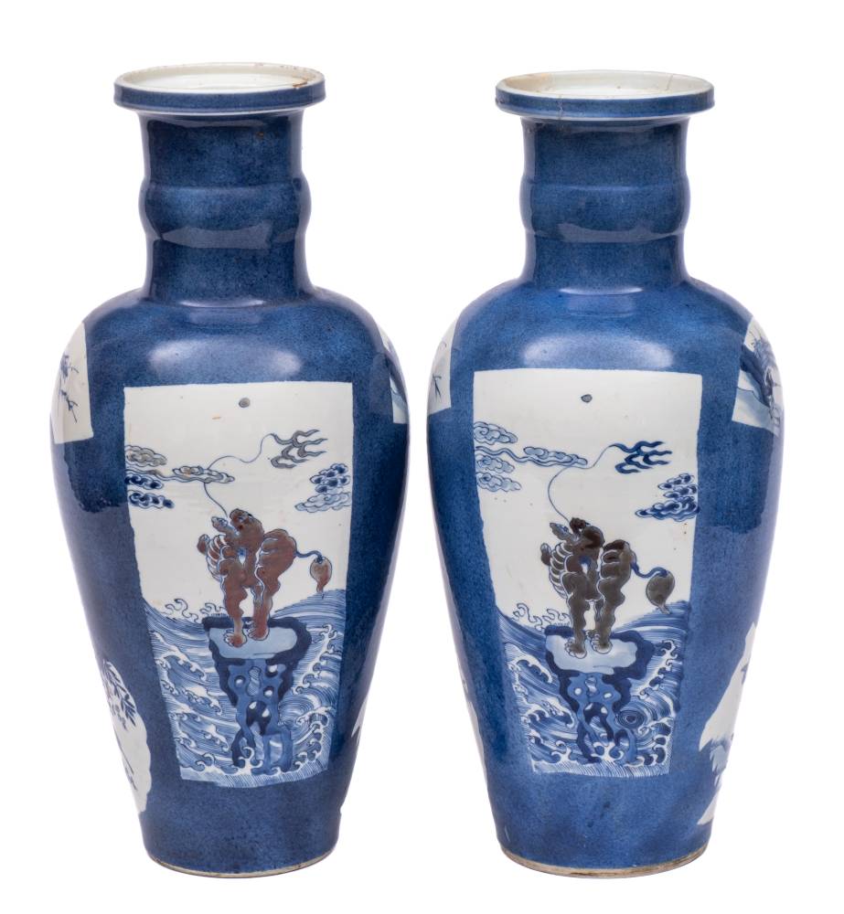 A pair of Chinese underglaze blue and copper-red rouleau vases: each of ovoid form with cylindrical