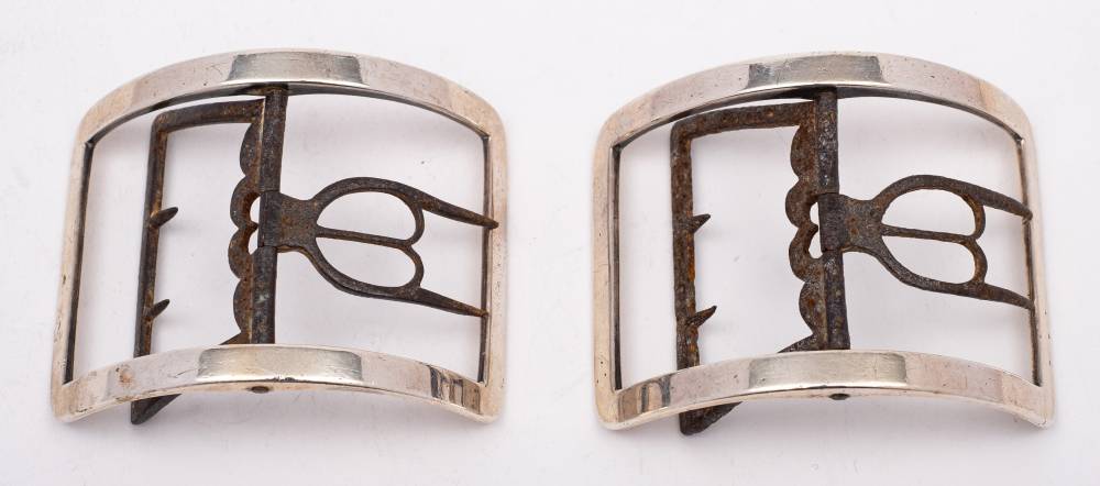 A pair of Georgian silver and steel buckles, unmarked: of plain rectangular outline, 7.5cm wide.