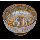 An Italian Deruta gold lustred maiolica high-footed bowl: decorated in blue and gold lustre with