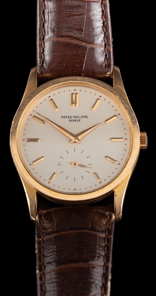 Patek Philippe, Calatrava, an 18 carat gold manual winding wristwatch,: the dial with baton markers,