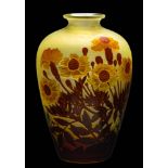 A Gallé cameo glass vase: of oviform the matt yellow body overlaid with amber and brown flowers and