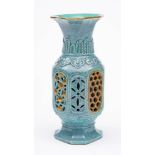 A Chinese robin's egg reticulated vase: of octagonal section with reticulated panels, part gilded,