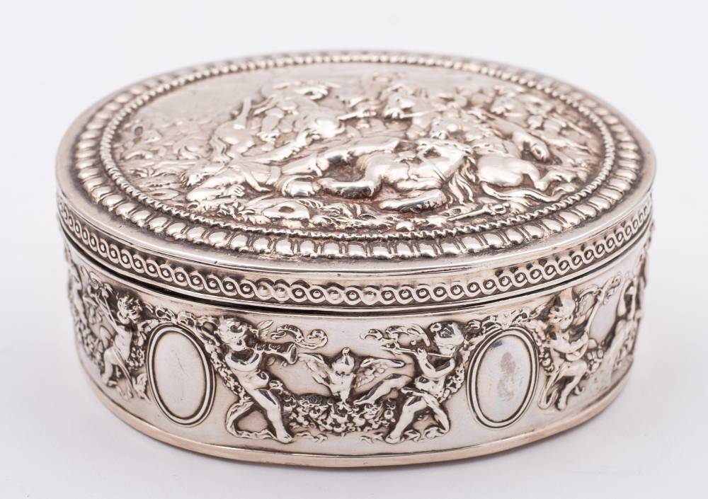 A continental silver silver casket, stamped marks and import marks: of oval outline,