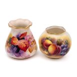 Two Royal Worcester porcelain vases: one of tapering form with frill rim painted by M.
