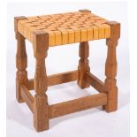 Workshop of Robert 'Mouseman' Thompson (Kilburn), an English oak stool,