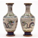 A pair of early 20th century Chinese cloisonne vases: of baluster form decorated with dragons