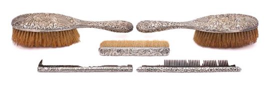 A pair of American Sterling silver backed hair brushes,