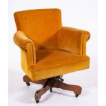 An upholstered and metal mounted swivel tub armchair, mid 20th century,
