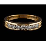 A diamond half eternity ring,: set with seven brilliant cut diamonds, approximately 0.