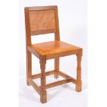 Workshop of Robert 'Mouseman' Thompson (Kilburn), an English oak panel back dining chair,