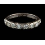 A diamond half eternity ring,: set with eight brilliant cut diamonds, approximately 0.