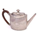 A George III silver teapot, maker Charles Hougham, London, 1792: of oval outline,