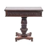 An Anglo-Indian carved and stained hardwood, probably padouk card table,