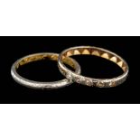 A diamond ring,: the band set with eight cut diamonds, ring size N 1/2; and a gold coloured band,