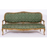 A carved and giltwood and upholstered canape in Louis XV taste, late 19th /early 20th century,