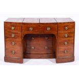 A George III mahogany bowfront dressing table and enclosed wash stand, early 19th century,