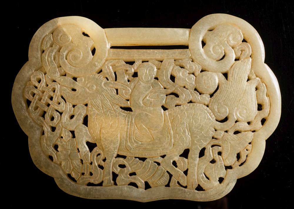 A large Chinese jade plaque in the form of a lock: carved and pierced to one side with a diety - Image 2 of 2