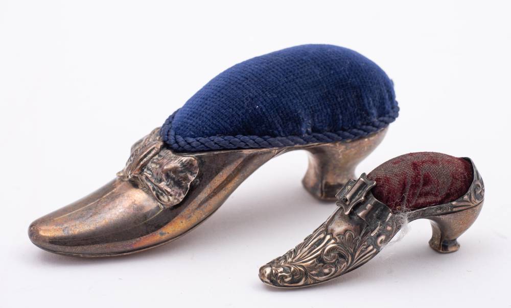 A Victorian novelty pin cushion, maker's mark worn, Birmingham, 1891: in the form of a shoe,