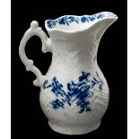 A First Period Worcester blue and white feather-moulded cream jug: of baluster form with double