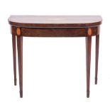 A George III mahogany and marquetry bow front card table, circa 1790,
