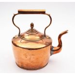 A large 19th century copper kettle: with lift-off lid having an acorn finial and swept spout,