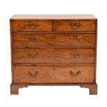 A George III mahogany and sycamore strung chest of drawers, circa 1770,