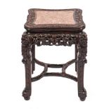 A Chinese carved hardwood and rouge marble inlaid stand, late 19th century,