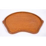 Workshop of Robert 'Mouseman' Thompson (Kilburn), an English oak tray,: kidney shaped,