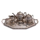 A silver three-piece tea service with matching tray, possibly Chinese,