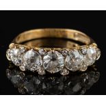 A diamond ring,: set with five old brilliant cut diamonds, approximately 1.