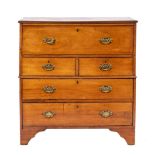 A George III hardwood campaign secretaire chest of drawers, circa 1800,: in two sections,