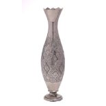 A Middle Eastern silver vase: with flared rim and slender ovoid body with floral decoration raised