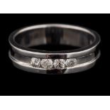 A 9 carat gold diamond ring,: the band set with four brilliant cut diamonds, stamped 375,