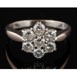 A diamond cluster ring,: set with brilliant cut diamonds, approximately 0.