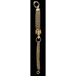 A gold coloured watch chain,: the chased foliate and polished curb links to an eagle, 20.5cm long.