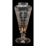 A large glass whisky dispenser: by L.Lumley & Co.Ltd.London, Rd.No.