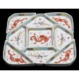 A Chinese famille rose nine-piece 'dragon and phoenix' supper set: each piece enamelled with a