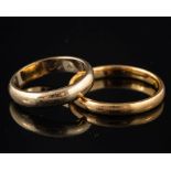 A 22 carat gold ring,: of plain polished form, stamped 22 with full London hallmarks, ring size O,
