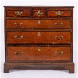 A George III oak and walnut banded chest of drawers, last quarter 18th century,