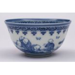 A Chinese blue and white 'boys' bowl: painted with five boys playing in a garden with a pine tree