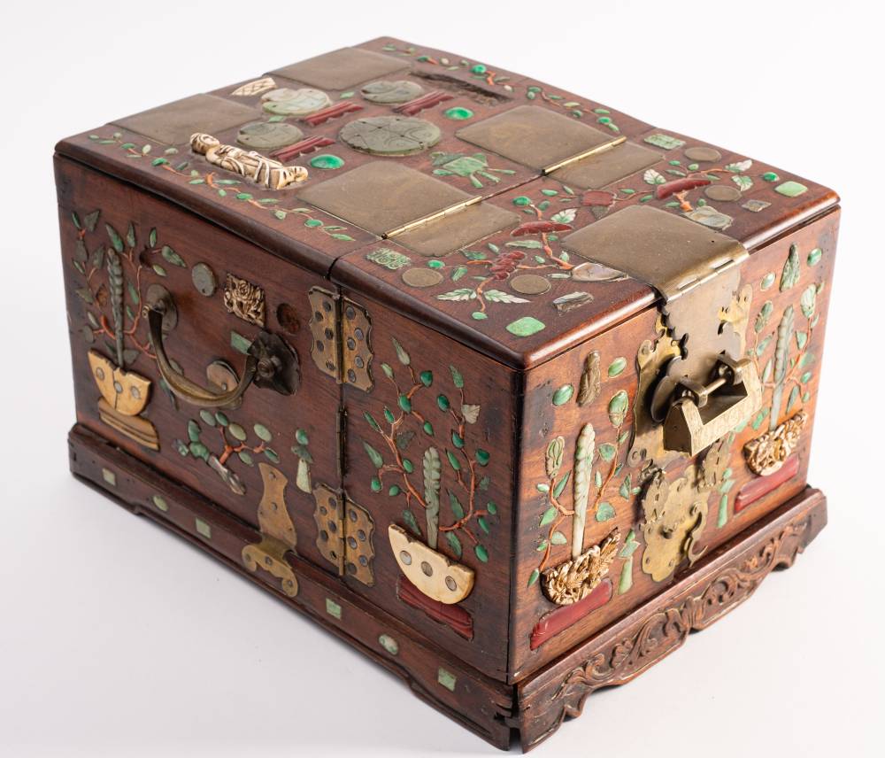 A Chinese inlaid hardwood travelling dressing box: the fitted interior with hinged mirror,