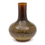 A Chinese 'eel-skin' glazed bottle vase: covered in a speckled glaze on a brown ground,