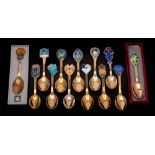 Thirteen Danish silver gilt and enamel Christmas spoons,