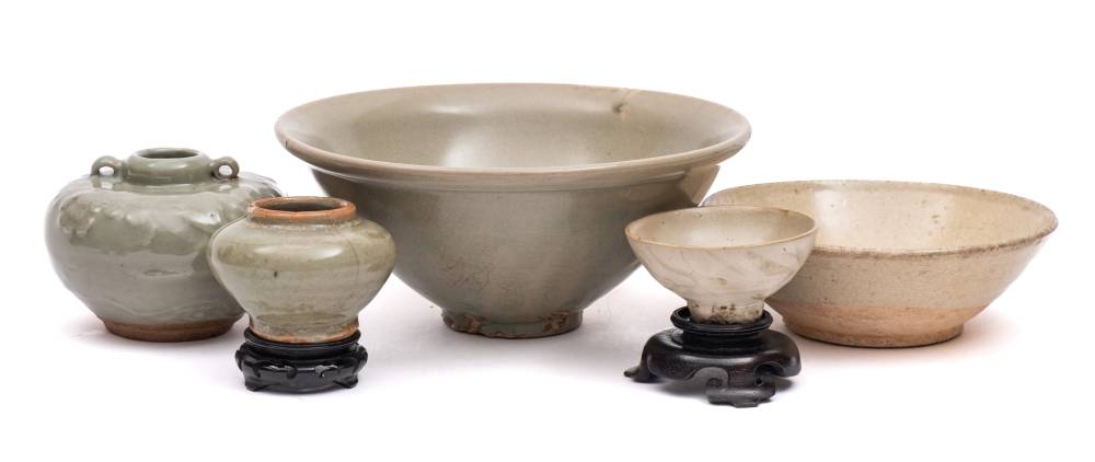 A Chinese celadon bowl, two similar small jars and two bowls,