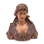 A Goldscheider terracotta bust: modelled as a young woman wearing a head scarf and ribbons under
