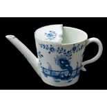 A Lowestoft blue and white feeding cup: painted to each side with flowering branches and a